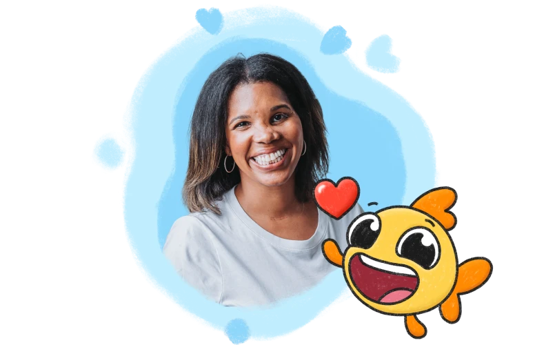 Dana with Finny, the Speech Blubs mascot
